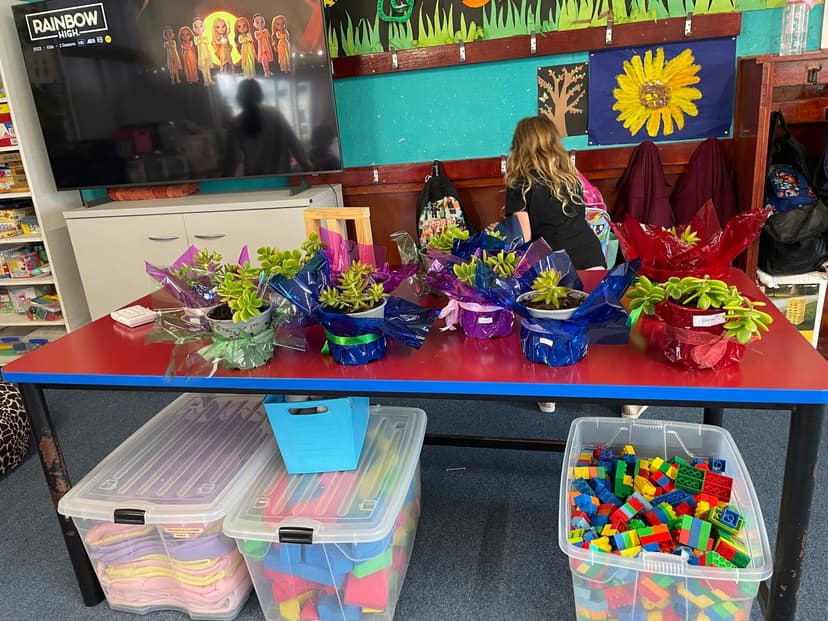 Inside the KidsKnection centre with art displays, Lego, and activities